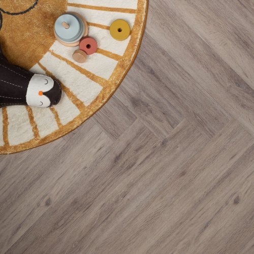 Douwes-Dekker-Ambitieus-Visgraat-Verlijmd-(Salmiak) van Douwes-Dekker in de kleur Salmiak - PVC vloeren